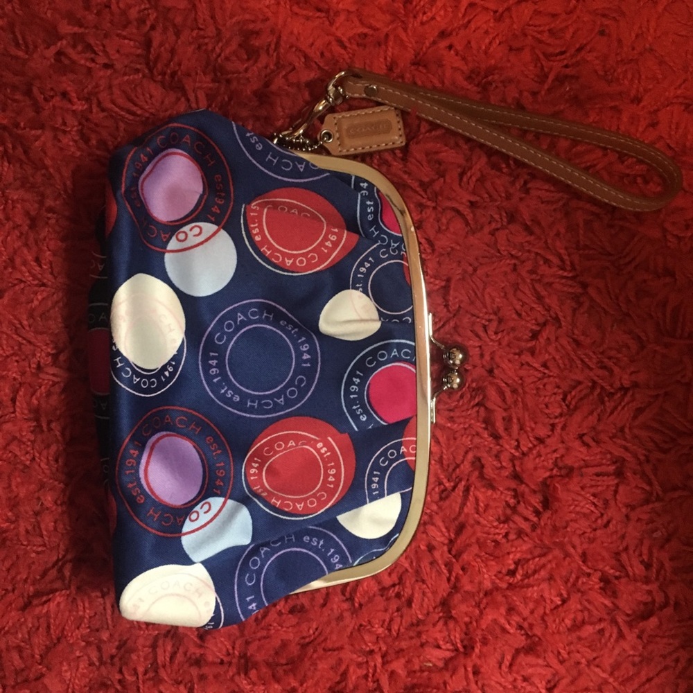 Red, white and blue coach wristlet